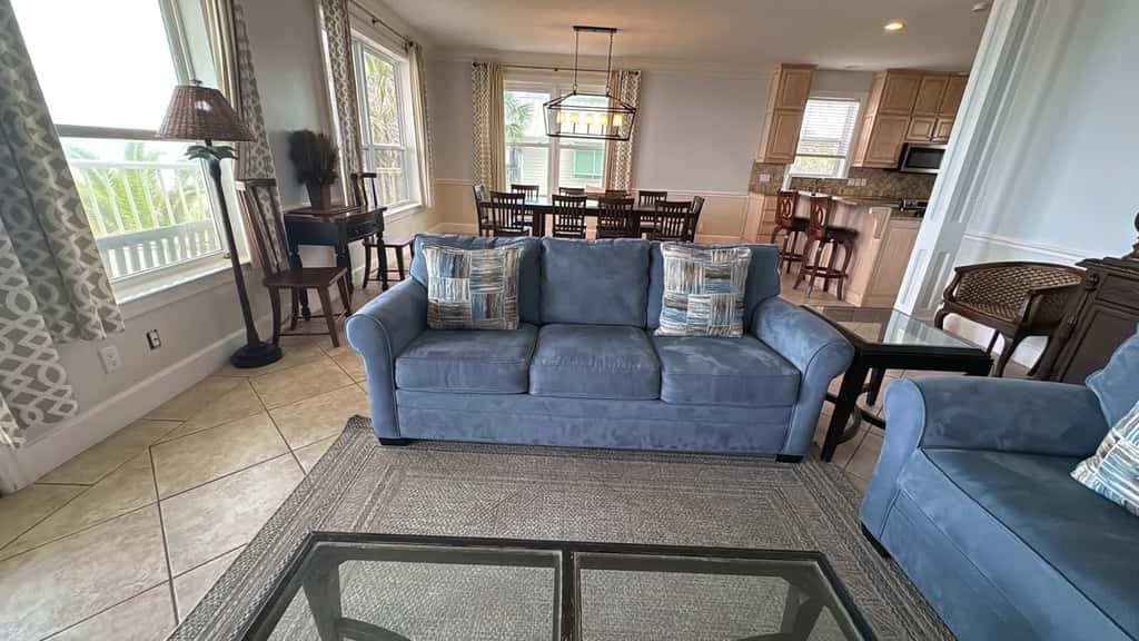 Upscale beachfront home with private hot tub, grill, on-site pools, gym, dogs OK
