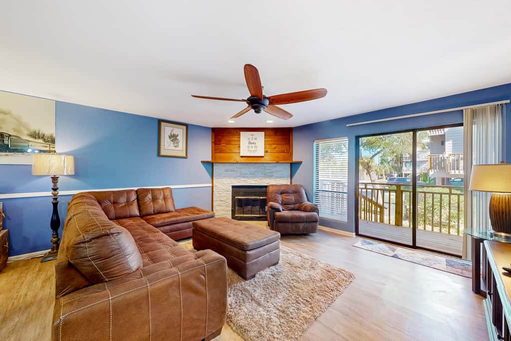 Inviting townhouse with on-site pool, updated interior, & W/D