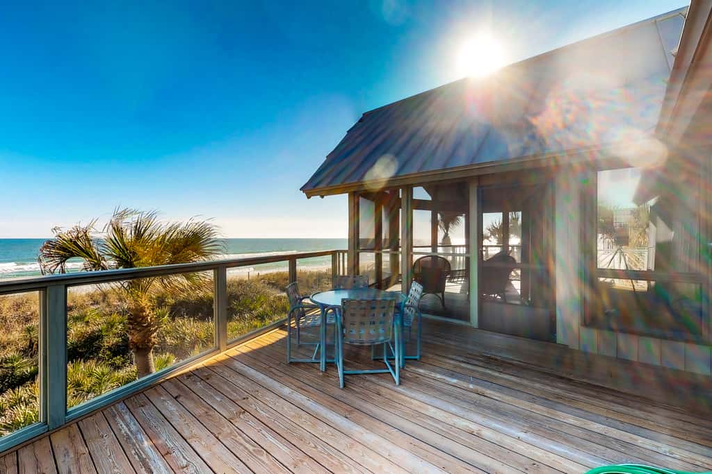 Snowbird-friendly beachfront home with a pool, tennis, washer&dryer, fireplace