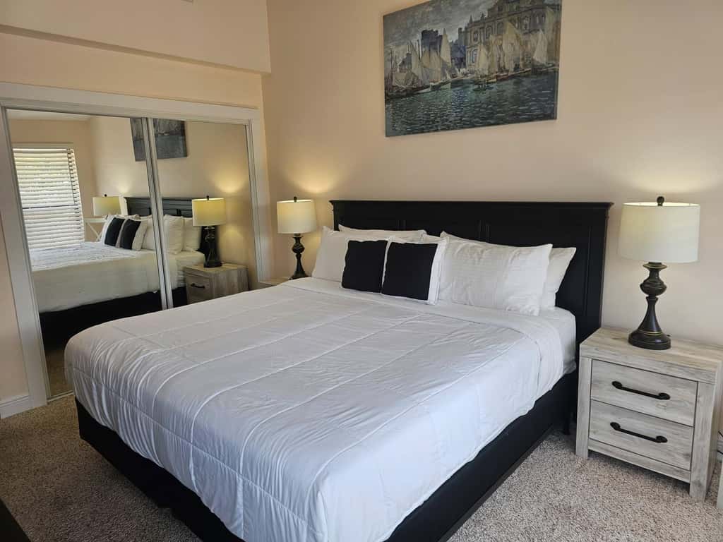 Comfortable townhome steps from beach with pool access, balcony, & WD