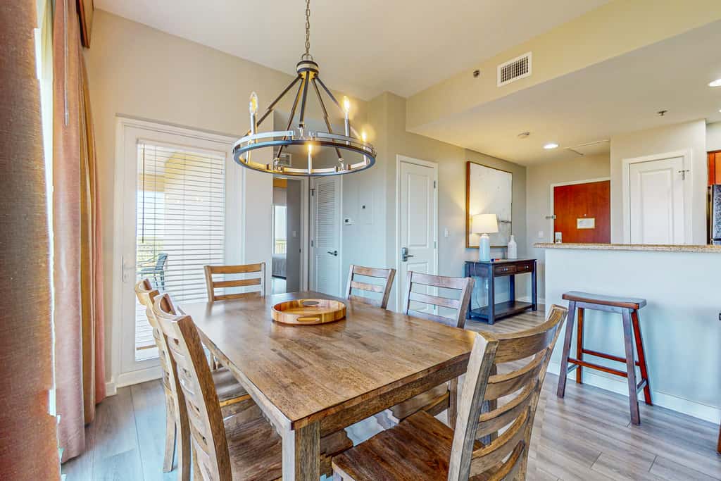 Bay-view condo 250 yards to beach w/sunset-view balcony, pool