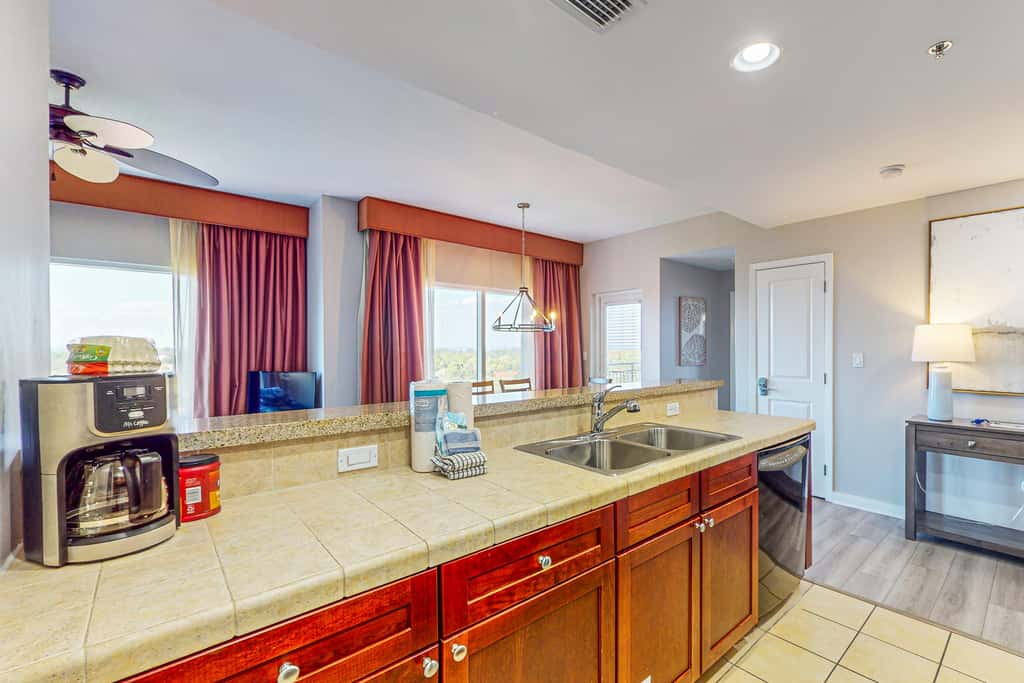 Bay-view condo 250 yards to beach w/sunset-view balcony, pool