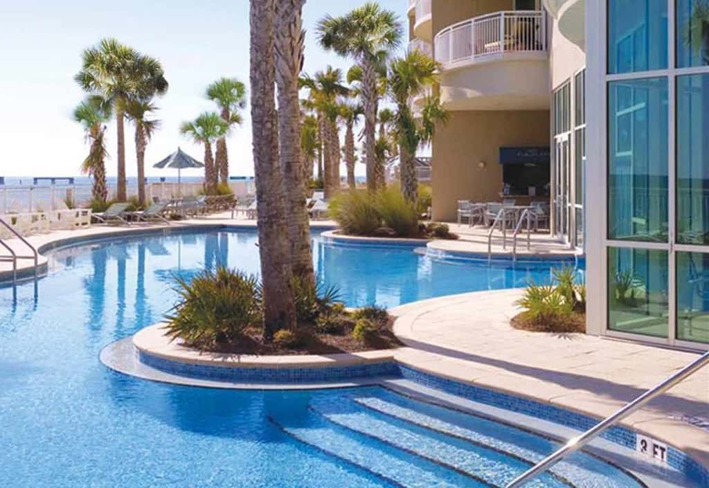 Stylish oceanfront condo including shared pool and beach access