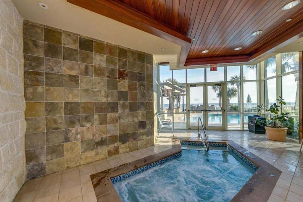 Stylish oceanfront condo including shared pool and beach access