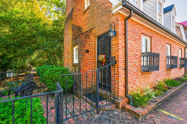 Charming brick home with patio, WiFi, AC, & W/D - walk to everything