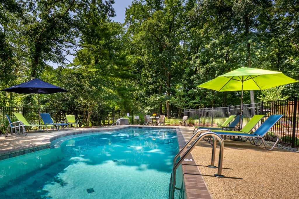 Spacious home with an outdoor pool, screened porch, washer/dryer & central AC