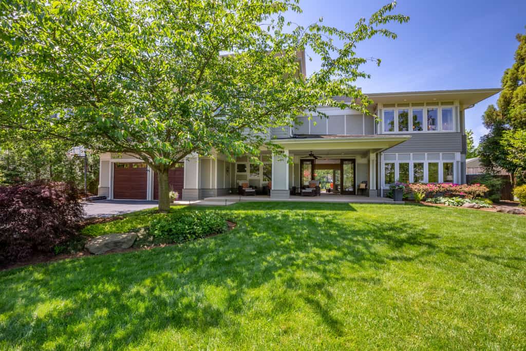 Lakefront home with private pool, hot tub, outdoor space, central AC, & W/D