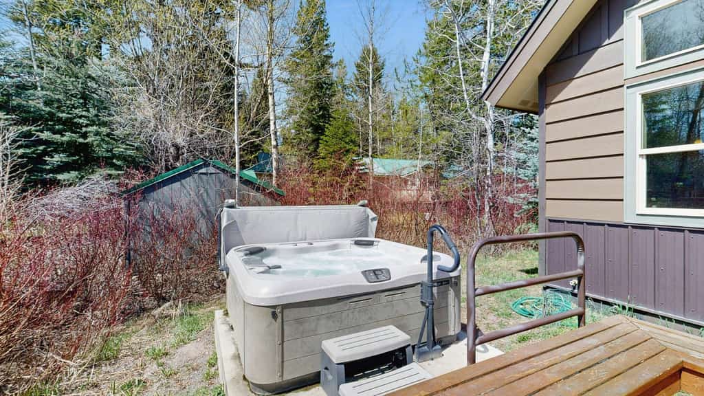 A bright, spacious McCall home designed for groups, featuring a hot tub, dedicated office, and comfortable spaces for gathering. Large windows fill the home with natural light, while the two-level deck with grill and outdoor seating creates an easy indoor-outdoor flow. With two king bedrooms, flexible sleeping options, and room to spread out, it’s ideal for families and groups.