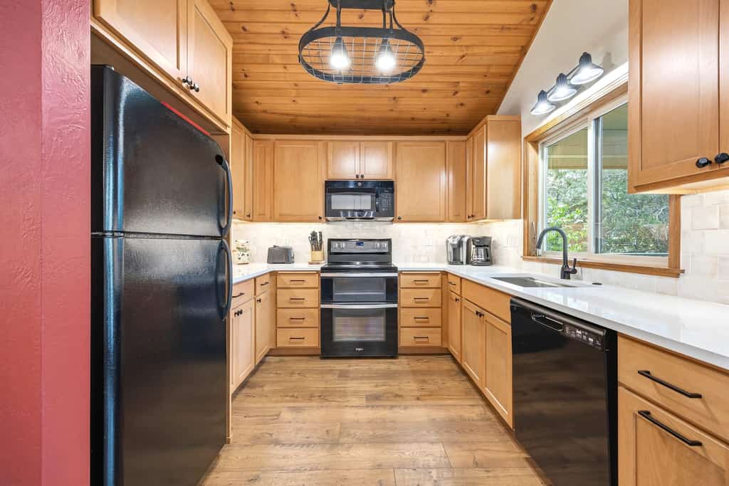 A spacious three-level McCall home just a short walk from downtown, Payette Lake, and local restaurants and shops. With dual wood-burning fireplaces, multiple living areas, and a private wooded setting, this home is designed for gathering year-round. Enjoy cozy cabin charm, forest views, and easy access to Brundage Mountain, hiking trails, and all that McCall has to offer.