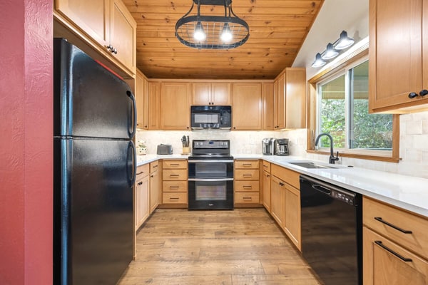 A spacious three-level McCall home just a short walk from downtown, Payette Lake, and local restaurants and shops. With dual wood-burning fireplaces, multiple living areas, and a private wooded setting, this home is designed for gathering year-round. Enjoy cozy cabin charm, forest views, and easy access to Brundage Mountain, hiking trails, and all that McCall has to offer.