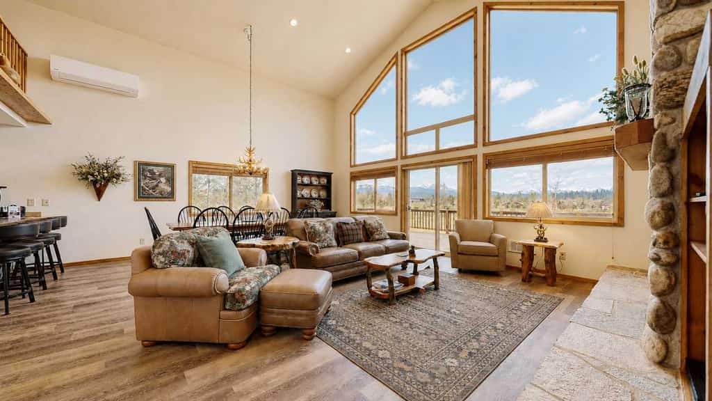 A spacious, multi-level home in the Spring Mountain Ranch community with mountain views, a large deck, air conditioning, and a full game room with pool table and wet bar. Designed for groups, the layout includes four king bedrooms, multiple living areas, and a main-level primary suite. Enjoy access to community amenities including a pool, hot tub, fitness center, and courts.