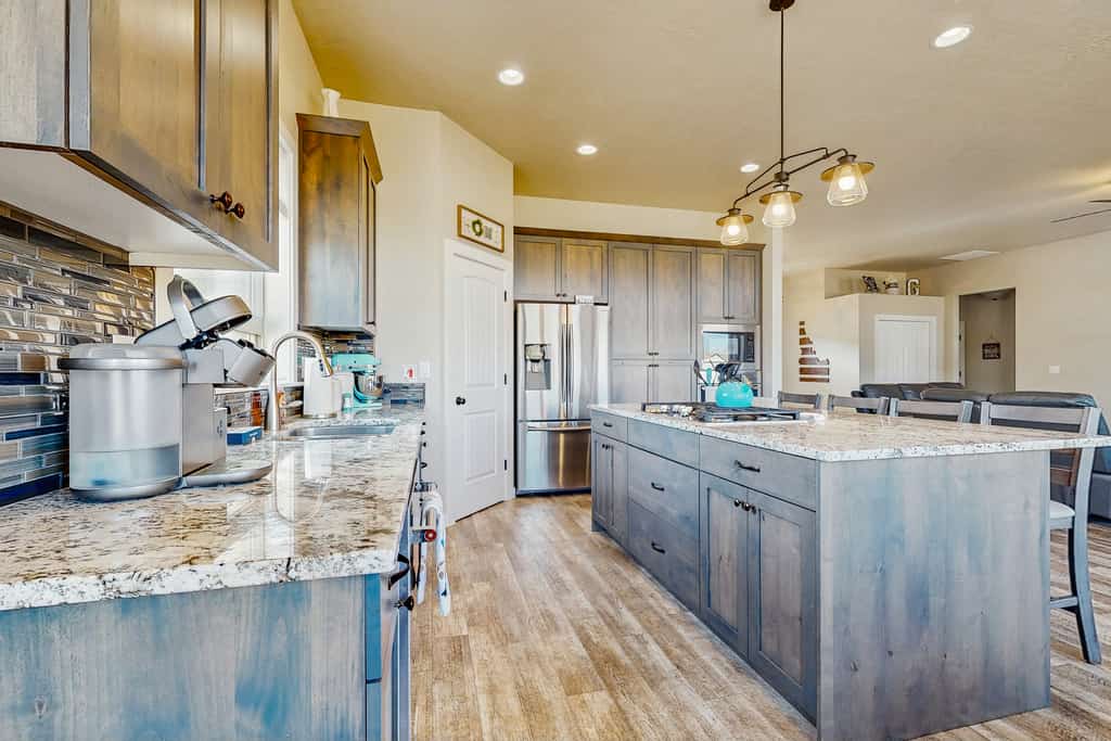 A stylish newer McCall home with a spacious open layout, covered patio, fire pit, and large driveway with room for RV parking. Located near Payette Lake, downtown McCall, and year-round outdoor recreation, this comfortable retreat offers three queen bedrooms, a large kitchen, gas fireplace, and inviting indoor-outdoor gathering spaces for families and small groups.