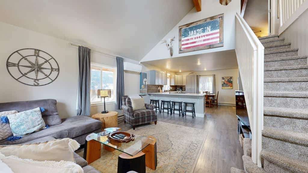 A cozy, pet-friendly McCall cottage with vaulted ceilings, warm cabin finishes, and a flexible layout for families or small groups. Features include a loft hangout space for kids, fire pit, outdoor patio, gas grill, stainless steel appliances, and a quiet setting just 1.5 miles from downtown McCall and Payette Lake.