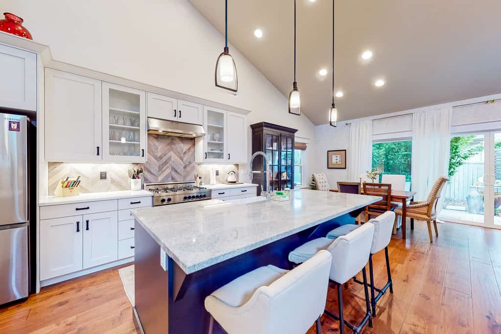 Beautifully designed North End farmhouse with three bedrooms, multiple living spaces, and a private backyard retreat. Enjoy a bright, open living area with vaulted ceilings, a gas fireplace, and a well-equipped kitchen, plus inviting outdoor dining and lounge areas. Conveniently located near Boise's foothills trails, Hyde Park, and downtown restaurants and attractions.