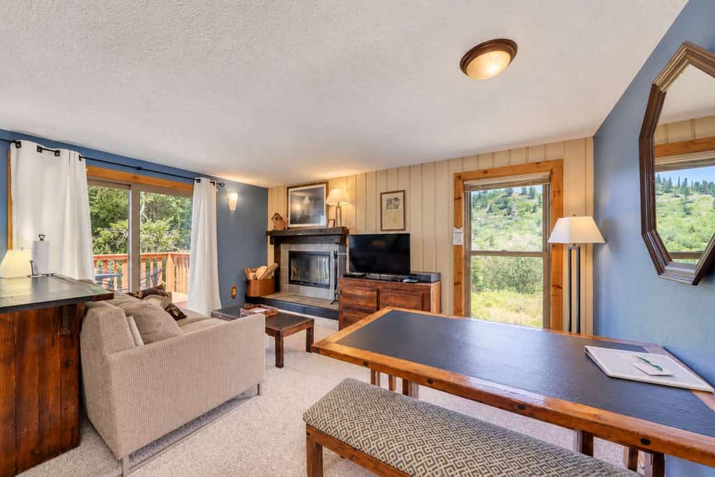 Enjoy direct mountain access from this second-floor ski-in/ski-out condo at Bogus Basin. Featuring a wood-burning fireplace, functional kitchen with dining area, and two private decks with tree-lined mountain views, it's a comfortable home base for skiing, hiking, and mountain biking. Guests also enjoy access to community recreation amenities. If you're unfamiliar with Bogus Basin, please review its mountain location before booking to ensure it's the right fit for your stay.