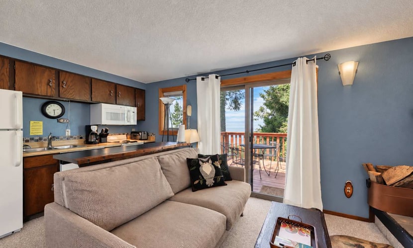 Enjoy direct mountain access from this second-floor ski-in/ski-out condo at Bogus Basin. Featuring a wood-burning fireplace, functional kitchen with dining area, and two private decks with tree-lined mountain views, it's a comfortable home base for skiing, hiking, and mountain biking. Guests also enjoy access to community recreation amenities. If you're unfamiliar with Bogus Basin, please review its mountain location before booking to ensure it's the right fit for your stay.