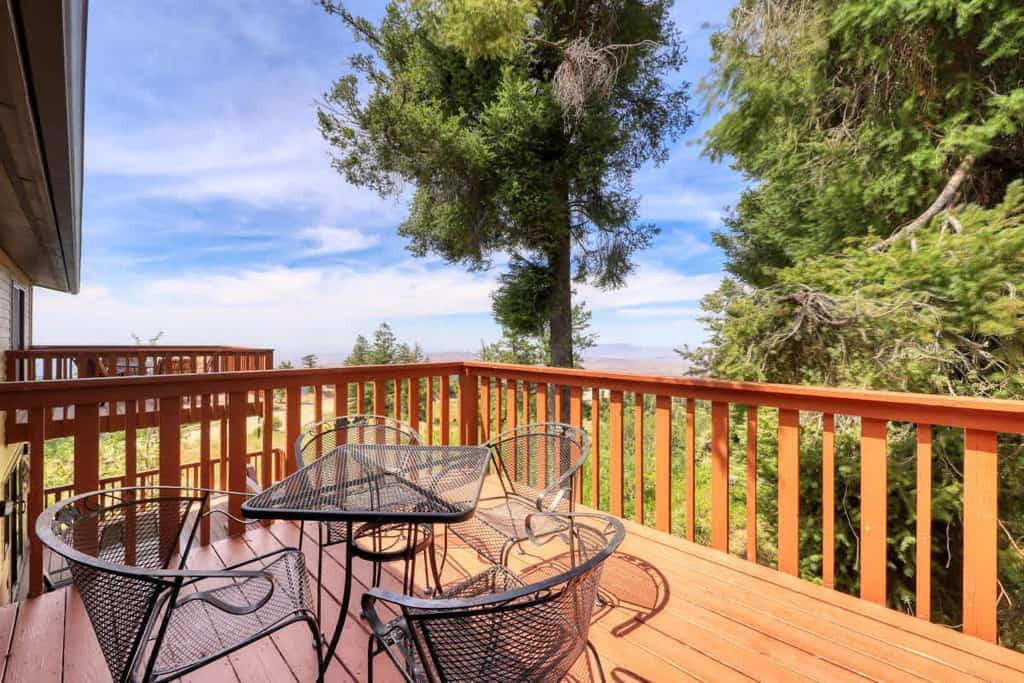 Enjoy direct mountain access from this second-floor ski-in/ski-out condo at Bogus Basin. Featuring a wood-burning fireplace, functional kitchen with dining area, and two private decks with tree-lined mountain views, it's a comfortable home base for skiing, hiking, and mountain biking. Guests also enjoy access to community recreation amenities. If you're unfamiliar with Bogus Basin, please review its mountain location before booking to ensure it's the right fit for your stay.