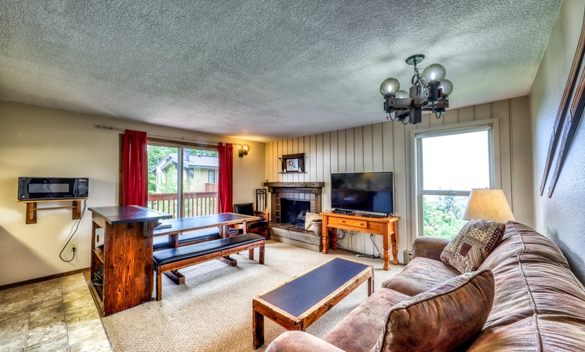 Stay slopeside at this first-floor ski-in/ski-out condo in the heart of Bogus Basin. Perfect for families, couples, or small groups, this mountain retreat features a private bedroom, cozy wood-burning fireplace, two private decks with mountain views, and direct access to the slopes. Spend the day skiing, hiking, or mountain biking, then unwind in the comfort of your mountain getaway just 20 miles from downtown Boise.