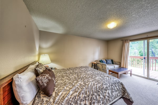 Stay slopeside at this first-floor ski-in/ski-out condo in the heart of Bogus Basin. Perfect for families, couples, or small groups, this mountain retreat features a private bedroom, cozy wood-burning fireplace, two private decks with mountain views, and direct access to the slopes. Spend the day skiing, hiking, or mountain biking, then unwind in the comfort of your mountain getaway just 20 miles from downtown Boise.