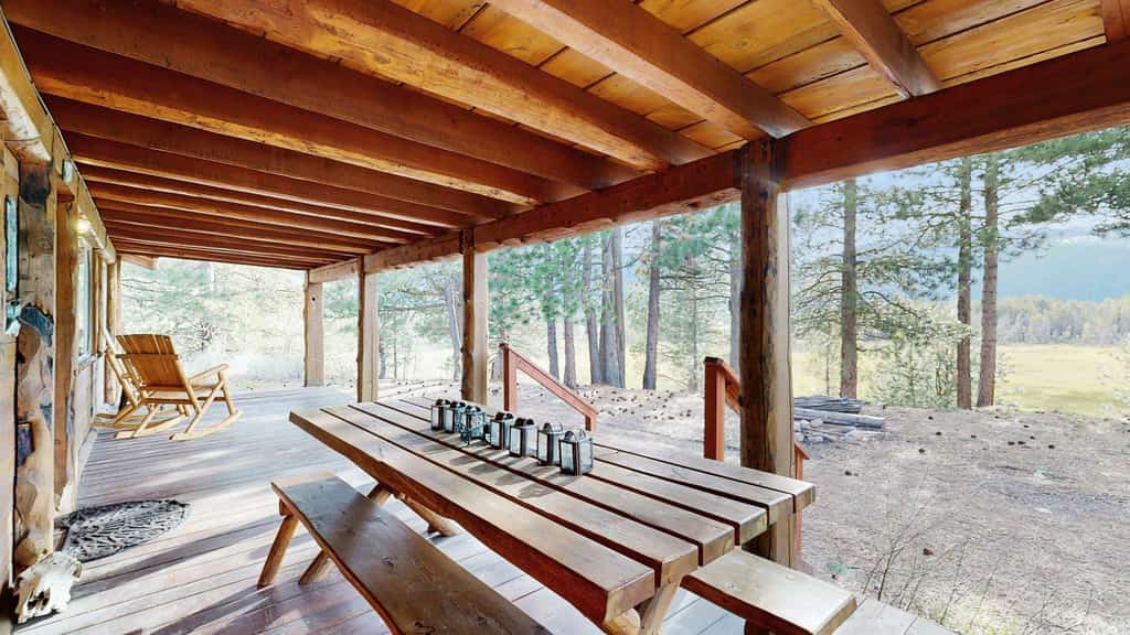 A secluded ranch cabin near Lake Cascade with views of the Payette River and hundreds of acres to explore. Designed for families, the home features two living rooms, separated bedroom wings, and two decks for outdoor dining and relaxing. Located 7 miles from Donnelly and 18 miles from McCall.