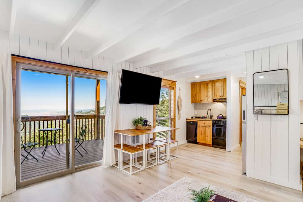 Stay slopeside at this first-floor ski-in/ski-out studio in the heart of Bogus Basin. Perfect for couples, families, or small groups, this mountain retreat offers direct access to the slopes, a cozy wood-burning fireplace, private deck with sweeping Horseshoe Bend Valley views, and flexible sleeping arrangements. Spend the day skiing, hiking, or mountain biking, then relax in the comfort of your mountain getaway just 20 miles from downtown Boise.