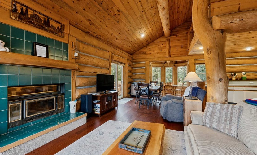 Classic log cabin in McCall with a private hot tub, large yard, and cozy mountain charm throughout. Featuring vaulted ceilings, multiple gathering spaces, flexible sleeping arrangements for larger groups, and a location just minutes from Payette Lake, this dog-friendly retreat is designed for memorable mountain getaways year-round.