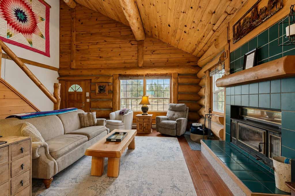 Classic log cabin in McCall with a private hot tub, large yard, and cozy mountain charm throughout. Featuring vaulted ceilings, multiple gathering spaces, flexible sleeping arrangements for larger groups, and a location just minutes from Payette Lake, this dog-friendly retreat is designed for memorable mountain getaways year-round.