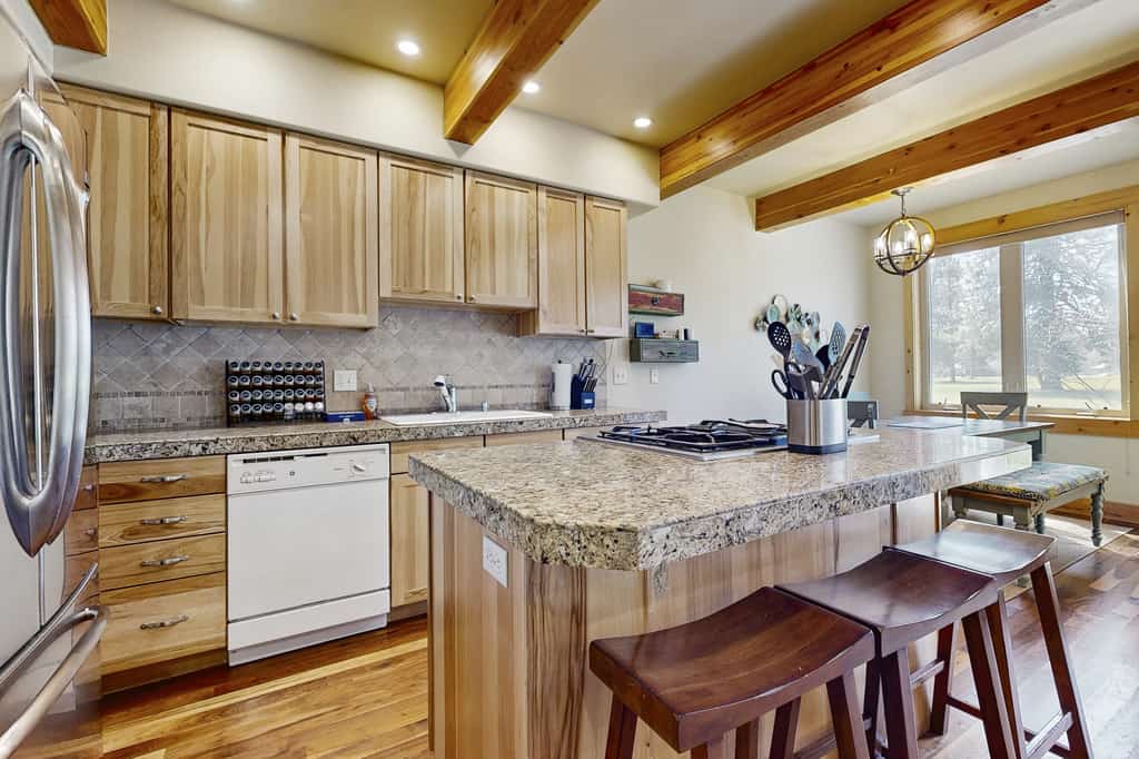 A bright golf course townhome overlooking the McCall Golf Course fairway with a Peloton bike, EV charger, upper deck, and a living room home theater projector for movie nights. Featuring three sleeping spaces, updated finishes, and easy access to Payette Lake and Ponderosa State Park, this comfortable retreat is ideal for year-round McCall adventures.