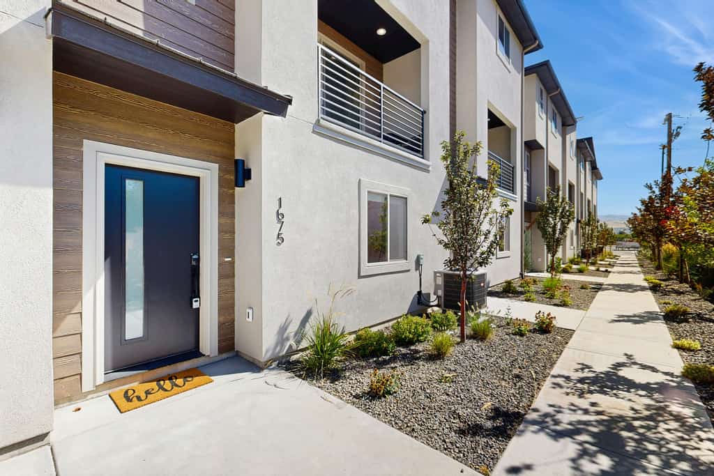 This modern 3-bedroom, 3.5-bathroom Boise townhome is conveniently located near Boise State University, downtown, and the airport. Spread across three levels, the home features an open-concept living area, fully equipped kitchen, private balcony, and room for up to six guests. With central A/C, a private two-car garage, and a dog-friendly policy, it's a great home base for exploring Boise. Please review all parking information before booking.