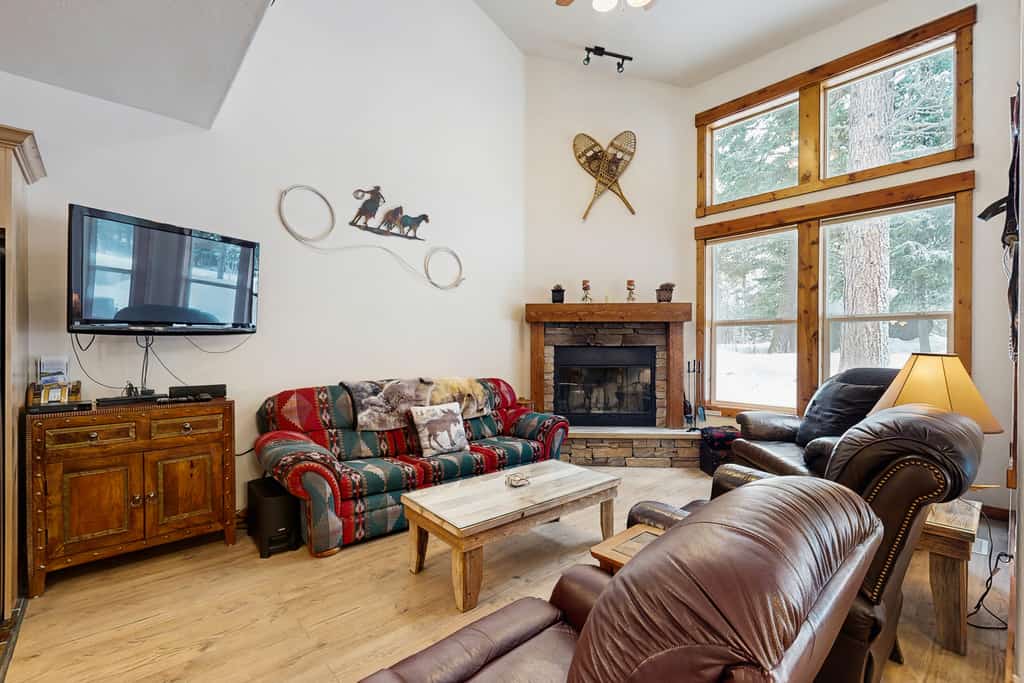 A spacious Aspen Village condo overlooking the McCall Golf Club with vaulted ceilings, a private patio and balcony, and access to resort-style community amenities including pools, hot tub, sauna, fitness center, and sports courts. Featuring multiple sleeping spaces, golf course views, and a bright open-concept layout, this comfortable retreat offers easy access to Payette Lake, Davis beach, downtown McCall, hiking trails, and year-round recreation.