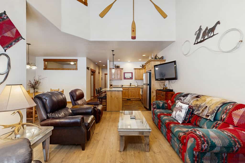 A spacious Aspen Village condo overlooking the McCall Golf Club with vaulted ceilings, a private patio and balcony, and access to resort-style community amenities including pools, hot tub, sauna, fitness center, and sports courts. Featuring multiple sleeping spaces, golf course views, and a bright open-concept layout, this comfortable retreat offers easy access to Payette Lake, Davis beach, downtown McCall, hiking trails, and year-round recreation.