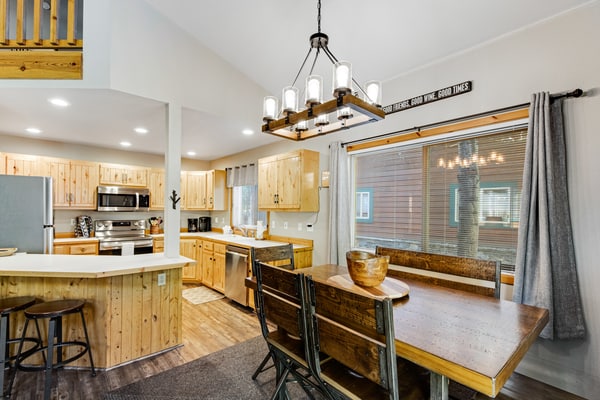 A cozy 3-bedroom cabin in the Spring Mountain Ranch community, offering the classic McCall cabin feel with modern decor and finishes that feel like home. Features a wood burning fireplace, inviting living spaces, and a private deck with outdoor dining. Enjoy access to community amenities including a pool, hot tub, fitness center, sauna, and courts.