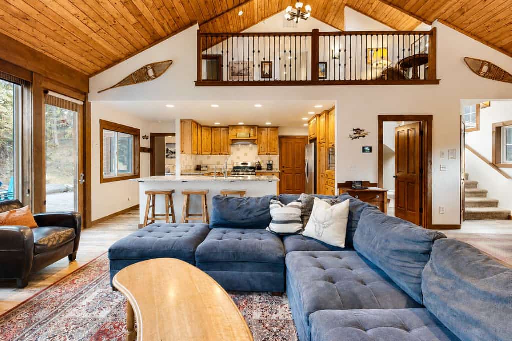 A private riverfront McCall retreat with multiple living spaces, stunning Payette River views, and resort-style amenities at home. Four bedrooms, a loft overlooking the river, a hot tub, sauna, air conditioning, and riverside fire pit create an unforgettable setting for families and groups looking to relax and reconnect.