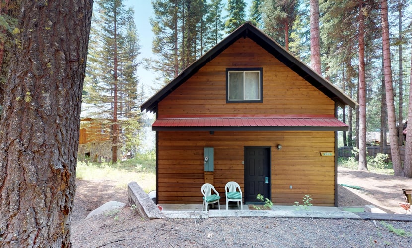 Classic lakefront cabin with a private dock, large deck, and direct access to Payette Lake. This nostalgic McCall retreat combines cozy cabin charm with beautiful lake views, updated beds, and an unbeatable waterfront setting just steps from the water.