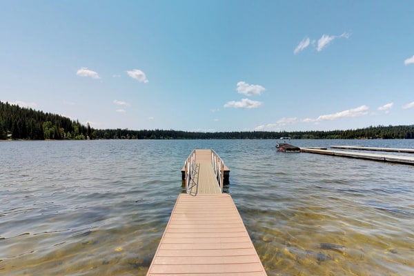 Classic lakefront cabin with a private dock, large deck, and direct access to Payette Lake. This nostalgic McCall retreat combines cozy cabin charm with beautiful lake views, updated beds, and an unbeatable waterfront setting just steps from the water.