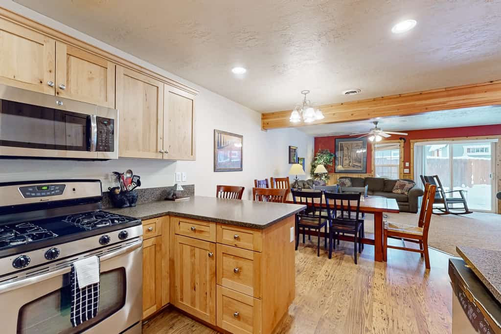 A cozy McCall condo within walking distance of Payette Lake, McCall Golf Course, and nearby walking trails. This three-bedroom retreat features a gas fireplace, fenced backyard patio, air conditioning, stainless steel appliances, and comfortable spaces for families or small groups. Conveniently located close to downtown McCall, local restaurants, and year-round outdoor recreation.