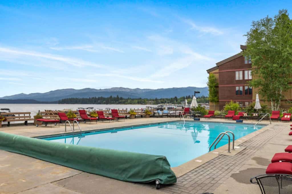 Located in the Crystal Beach Condos on Payette Lake, this top-floor unit offers lake views from the main living spaces and an enclosed balcony overlooking the water. With two bedrooms and a comfortable layout, it’s a great fit for couples or small groups. Enjoy private beach access, a seasonal pool, and a location just one block from downtown McCall.