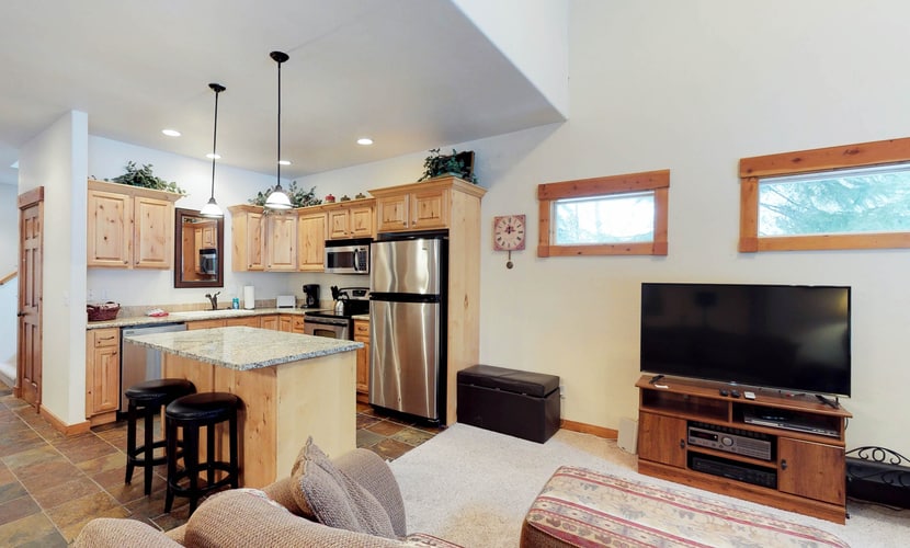 A spacious Aspen Village condo with vaulted ceilings, a wood-burning fireplace, and a private covered patio just minutes from Payette Lake, downtown McCall, and Ponderosa State Park. Featuring a flexible family-friendly layout with a loft, bunk room, office space, and access to resort-style community amenities including pools, hot tub, sauna, fitness center, and sports courts, this condo is an easy home base for year-round mountain adventures.