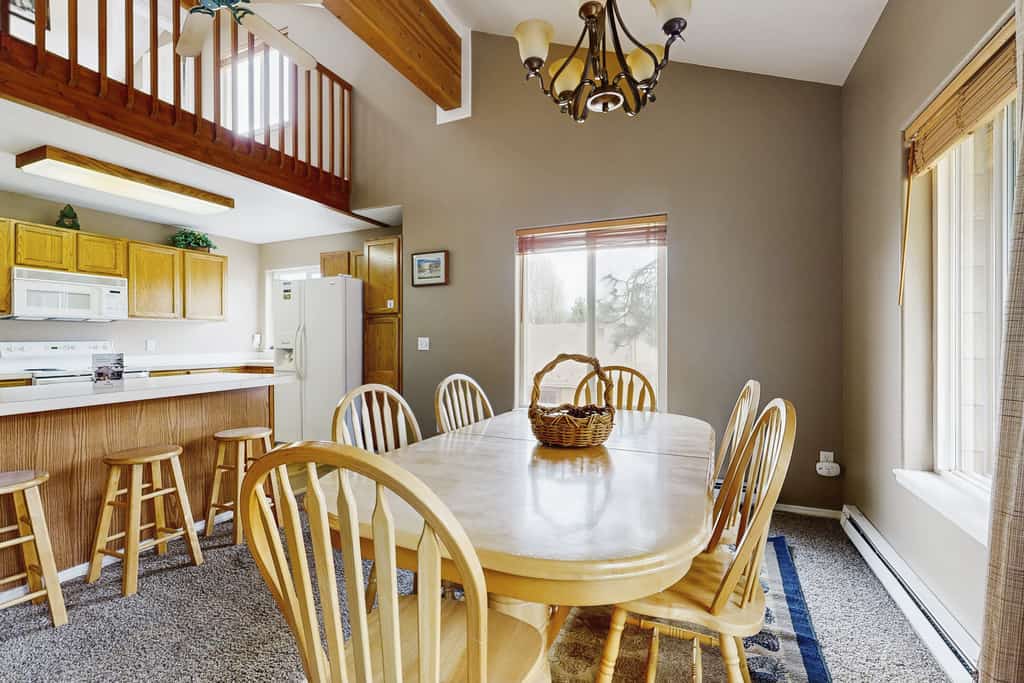 A cozy two-story condo in Aspen Village with access to indoor and outdoor pools, hot tub, fitness center, and courts for tennis, pickleball, and racquetball. Featuring vaulted ceilings, a wood-burning stove, multiple sleeping spaces, and a balcony with outdoor seating, this centrally located McCall retreat is close to Payette Lake, downtown, and McCall Golf Club.