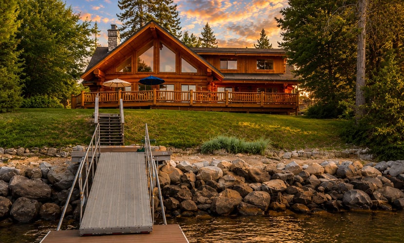 A stunning waterfront log cabin on Lake Cascade with a private dock, expansive deck, and incredible views across the lake to Tamarack Resort. Designed for memorable group getaways, this three-level retreat features a grand stone fireplace, multiple game areas, lakefront outdoor living, and flexible sleeping spaces for families and friends to gather year-round.