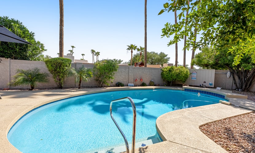 Quiet Scottsdale retreat with enclosed yard, pool, patio, grill, game room & W/D