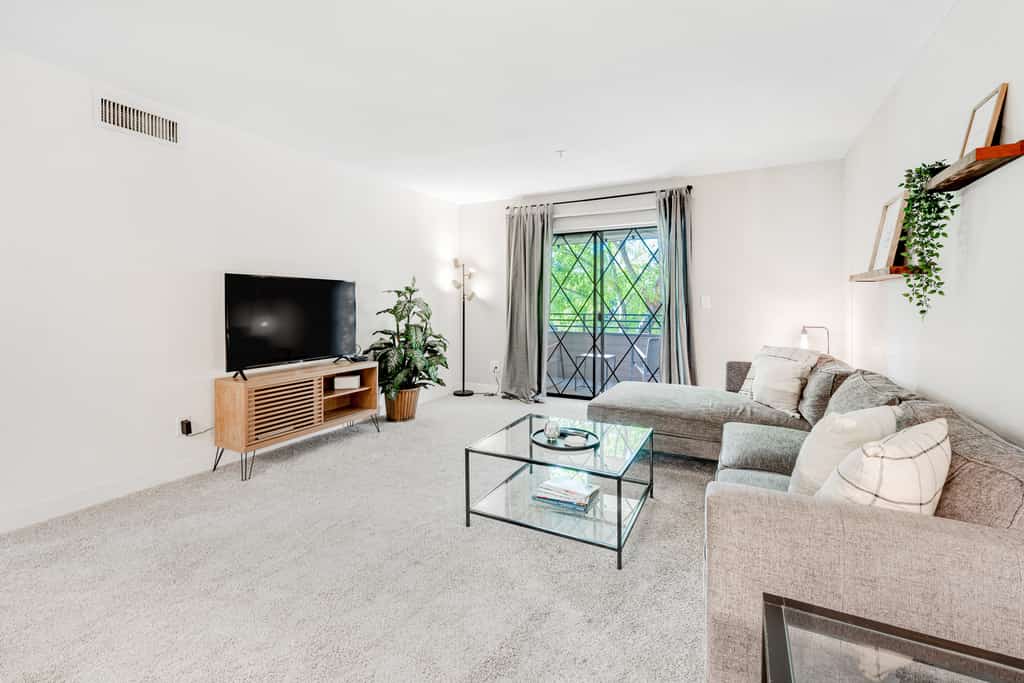Stylish updated condo with balcony, pool, & hot tub - near golf and greenway