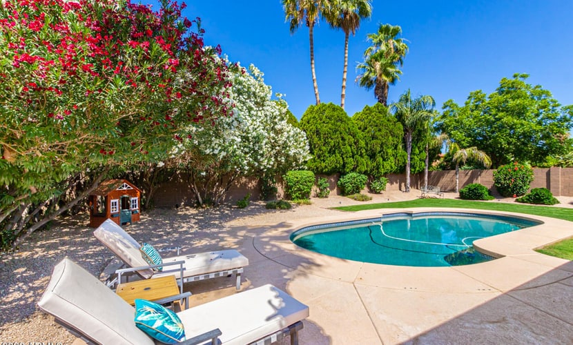 Beautiful single-level home with enclosed yard, pool, patio & WiFi