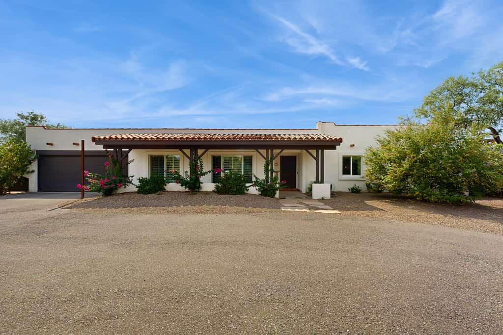 Dog-friendly modern stay with a heated private pool, sun room, & grill