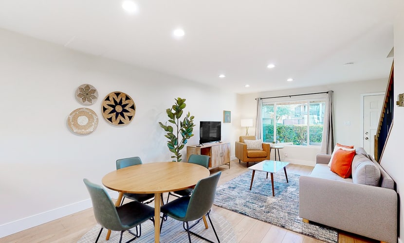 2-story dog-friendly condo with patio, outdoor pool, W/D, streaming, partial AC