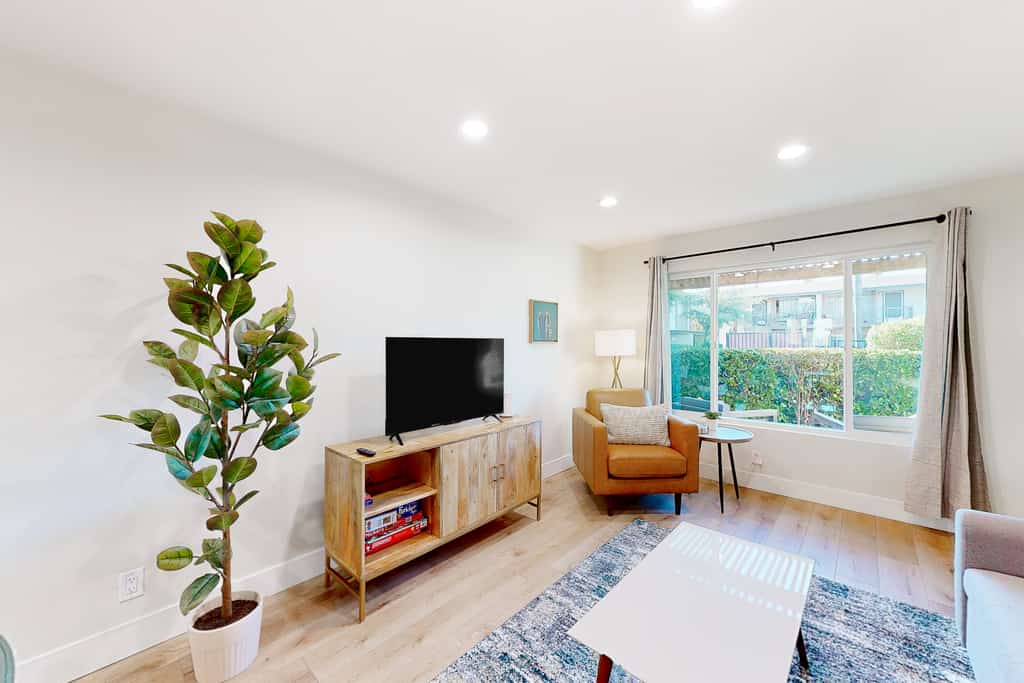 2-story dog-friendly condo with patio, outdoor pool, W/D, streaming, partial AC