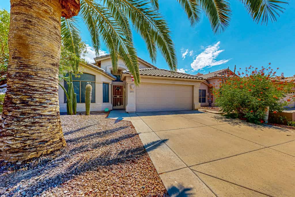 Updated home with private pool, enclosed yard, covered patio, grill, & W/D