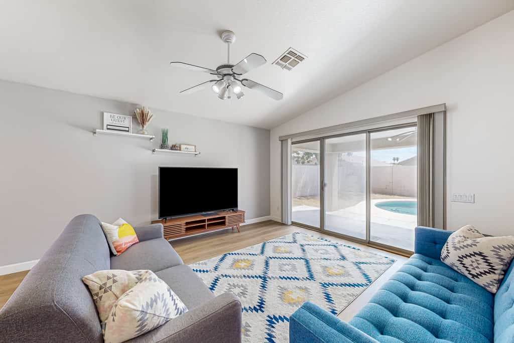 Updated home with private pool, enclosed yard, covered patio, grill, & W/D