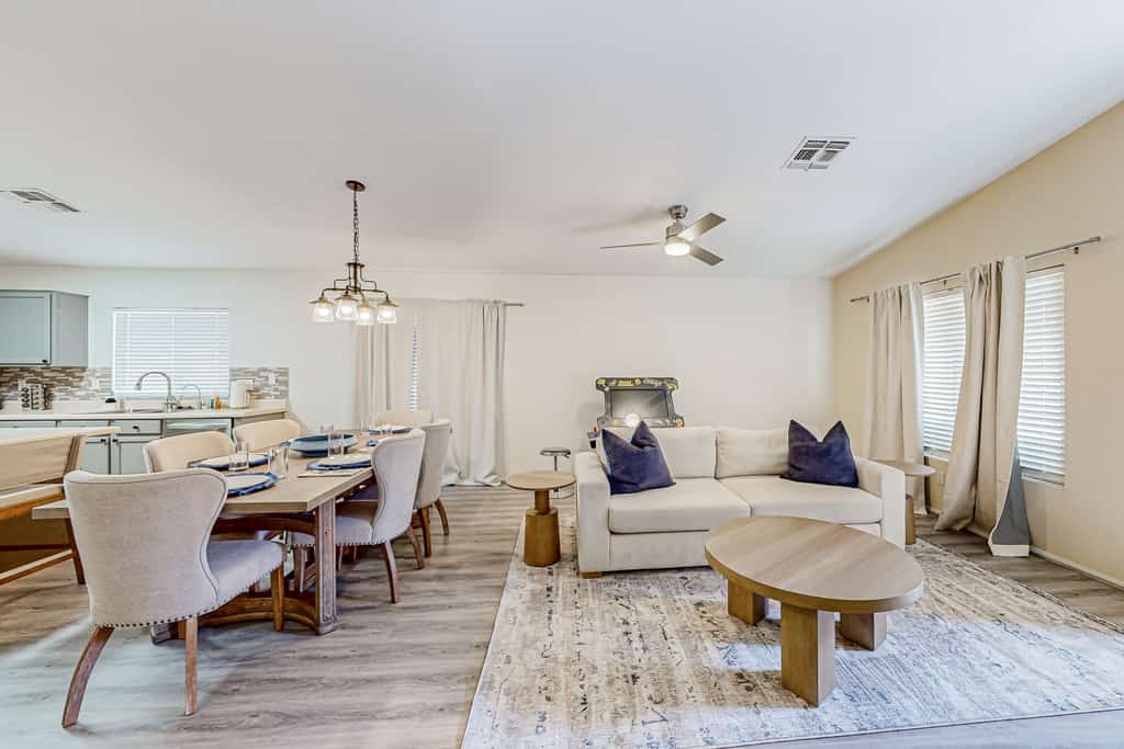 Spacious desert home with hot tub, covered patio, grill, & modern finishes