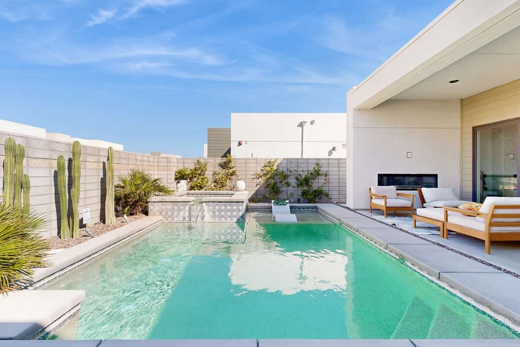 Desert days, cozy nights, and poolside delights await at this stylish home.